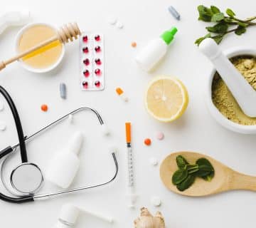 Natural treatment pharmacy pills with stethoscope 360x320